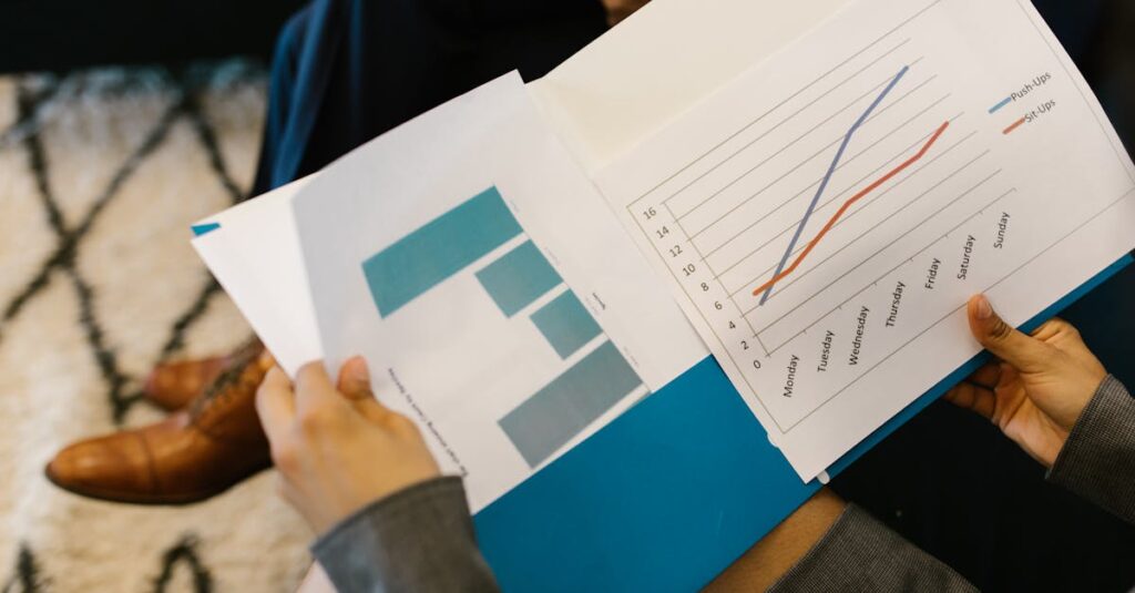 Detailed view of business reports with graphs during a corporate meeting.
